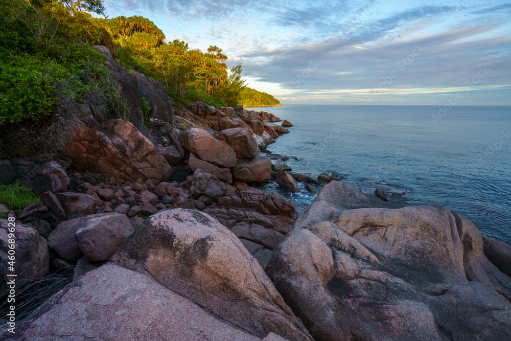 sunset at tropical beach at anse lazio on praslin, seychelles sunset at tropical beach at anse lazio on praslin, seychelles