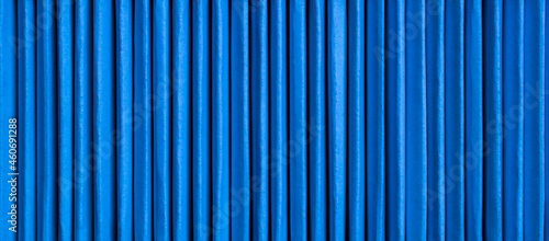  blue vertical lines of cardboard boxes for background or texture