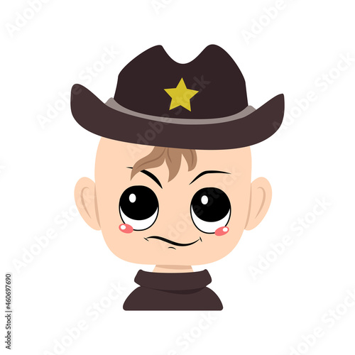 Boy with emotions of suspicious, displeased eyes in sheriff hat with yellow star. Cute kid with annoyed expression in carnival costume for holiday. Head of adorable baby