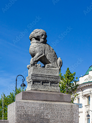 Granite mythological lion-guardian of Shi-tzu in St. Petersburg