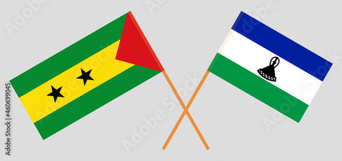 Crossed flags of Sao Tome and Principe and Kingdom of Lesotho. Official colors. Correct proportion
