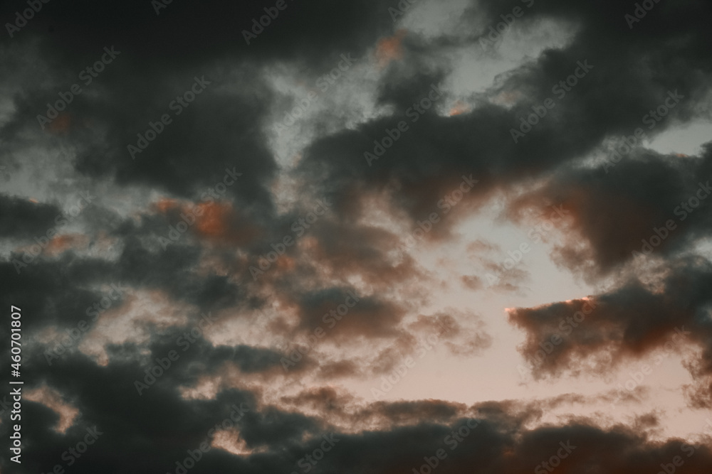 Obraz premium yellow and orange clouds at sunset. dramatic sky skyline background 