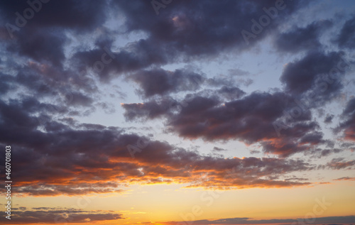 dramatic sky skyline background. orange clouds at sunset 