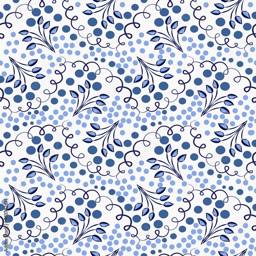 Blue seamless pattern with twigs and dots in the style of classic cobalt porcelain painting. Floral tiled background for wallpaper, clothes or wrapping paper.