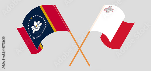 Crossed and waving flags of The State of Mississippi and Malta