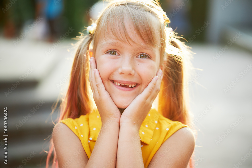 Toothless childish smile. Little cute girl child laughs, shows the