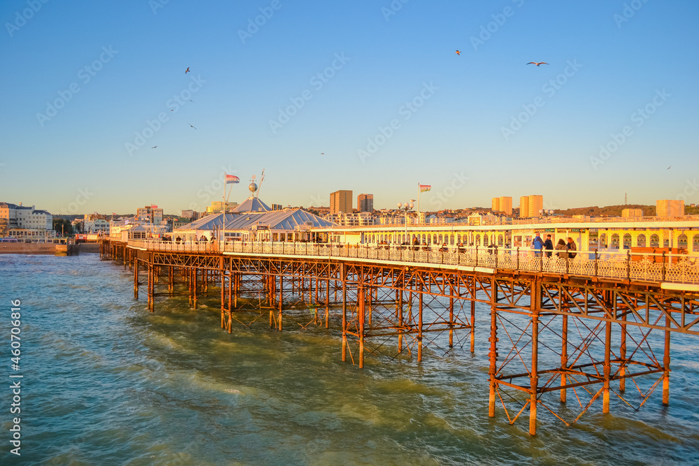 UK, Brighton, 01.10.2021: Brighton's big famous pier. Close up view during sunset