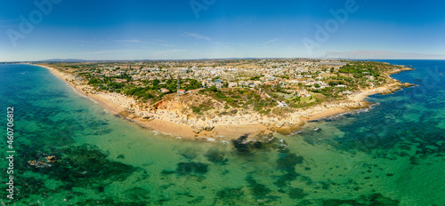 Fototapeta Naklejka Na Ścianę i Meble -  Panoramic aerial view of Praia Da Gale beach, near Albufeira and Armacao De Pera, Algarve, Portugal