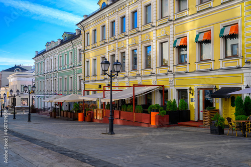 Stoleshnikov lane with tables of cafe in Moscow, Russia. Moscow architecture and landmark. Moscow cityscape