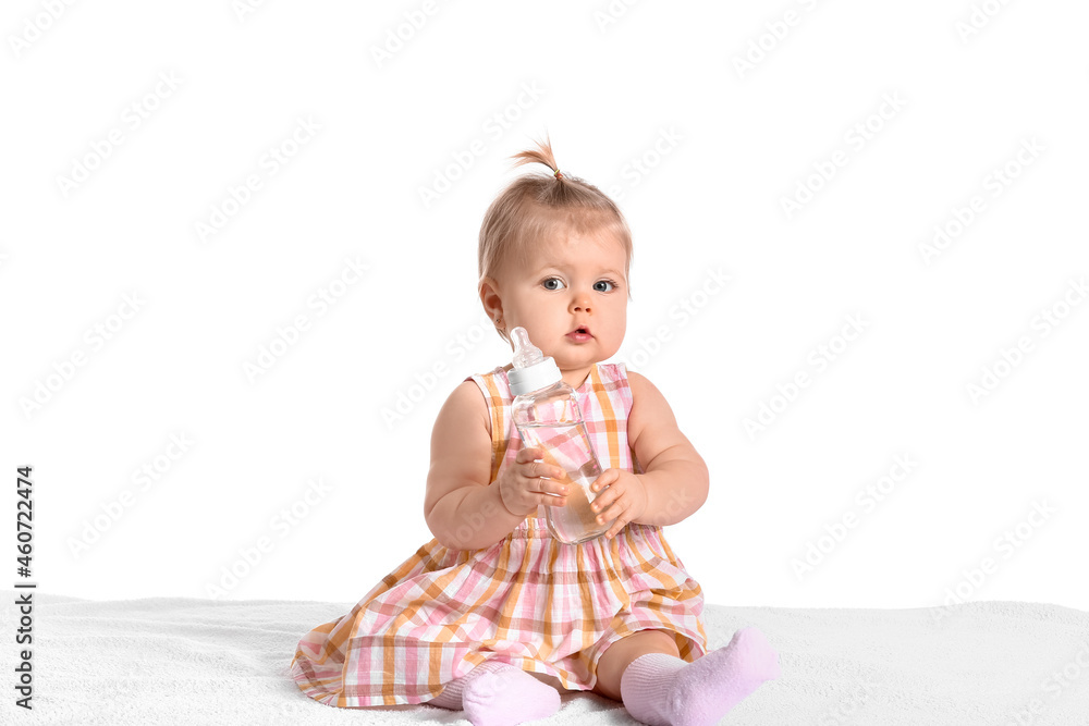 Cute baby girl with bottle of water on white background Cute baby girl with bottle of water on white background