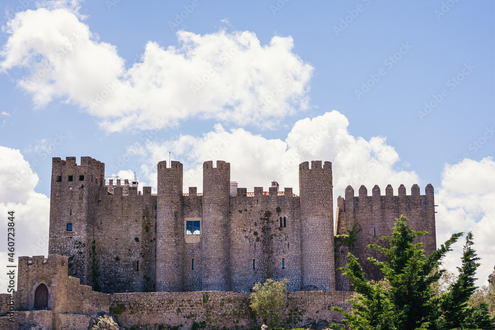 ancient stone castle under blue sky