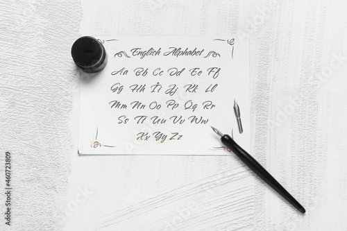 Paper with alphabet, nib pe...