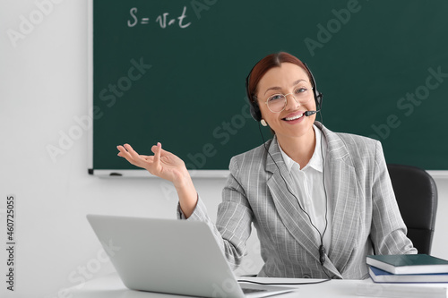 Teacher conducting lesson o...