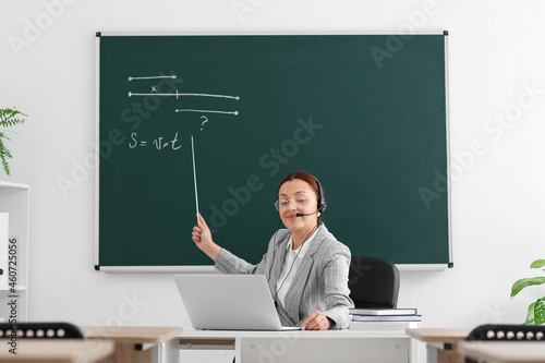 Teacher conducting lesson o...