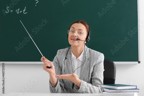 Teacher conducting lesson o...