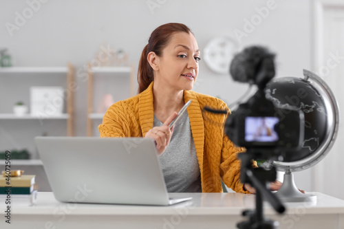 Teacher recording video for...