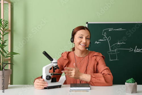 Teacher conducting biology ...