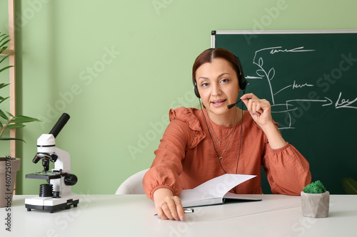 Teacher conducting biology ...