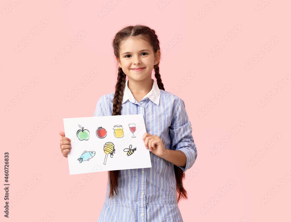 Little girl holding paper with drawings for Rosh Hashanah (Jewish New Year) on color background Little girl holding paper with drawings for Rosh Hashanah (Jewish New Year) on color background