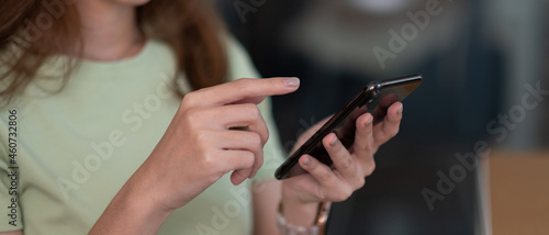 point finger on screen mobile phone closeup  person texting text message girls using in hands cellphone close up  online internet.