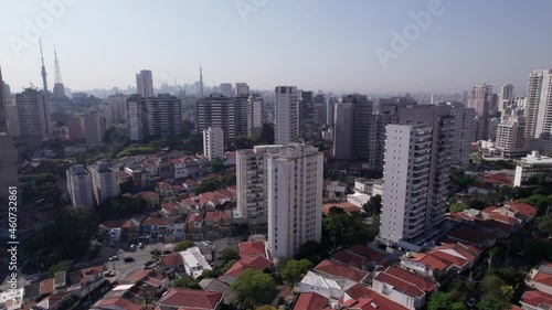 Crane shot going up in the residential area of Vila Madalena in Sao Paulo Brazil.  photo