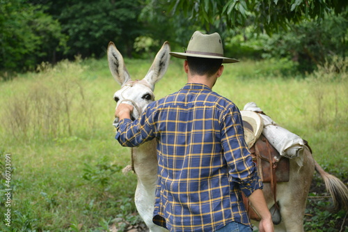 Φωτογραφία ranchero y su burro