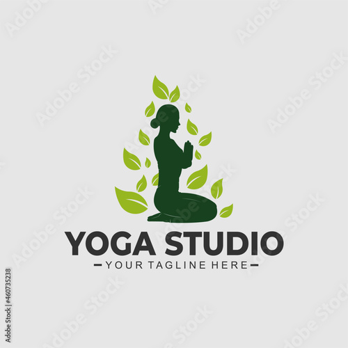yoga studio logo with illustration of woman sitting and sprinkled with green leaves