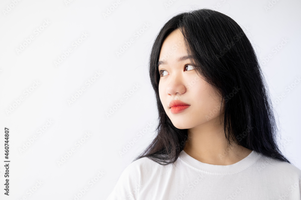 Natural beauty care. Asian woman. Skin treatment. Advertising background. Pretty dark haired lady red lipstick isolated white copy space. Natural beauty care. Asian woman. Skin treatment. Advertising background. Pretty dark haired lady red lipstick isolated white copy space.