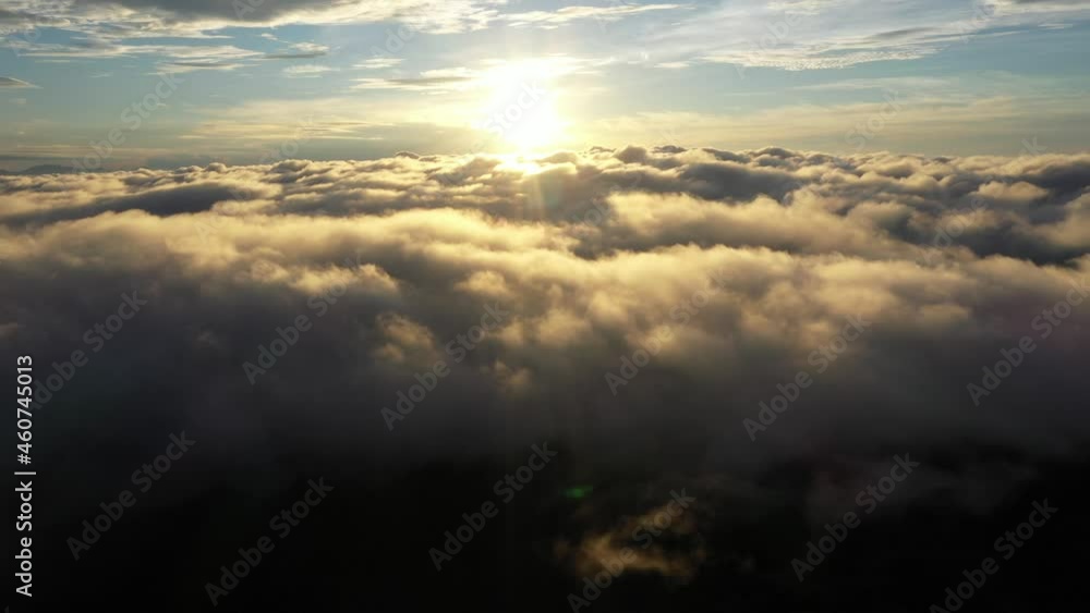 Aerial view flying to Sunrise with sea of clouds in Chiangmai, Thailand. Aerial view flying to Sunrise with sea of clouds in Chiangmai, Thailand.