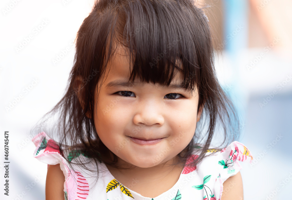 A headshot portrait of a cheerful baby Asian woman, a cute toddler little girl with adorable bangs hair, a child wearing a white sweater smiling and looking to the camera. A headshot portrait of a cheerful baby Asian woman, a cute toddler little girl with adorable bangs hair, a child wearing a white sweater smiling and looking to the camera.
