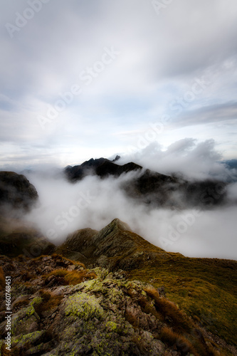 Mountain landscape with clouds around the peaks