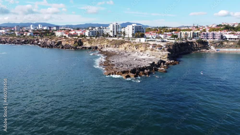 Pedra do Sal Viewpoint Adjacent To Sao Pedro do Estoril Beach On A Sunny Day In Lisbon, Portugal. - aerial approach Pedra do Sal Viewpoint Adjacent To Sao Pedro do Estoril Beach On A Sunny Day In Lisbon, Portugal. - aerial approach