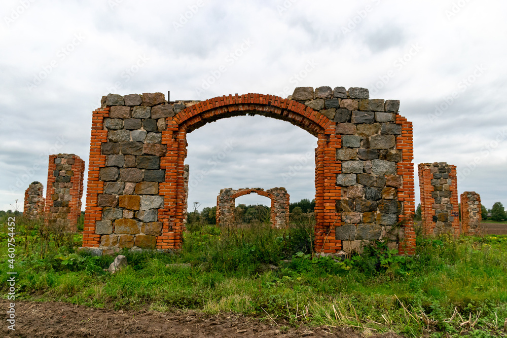 The stone and brick ruins are an unofficial tourist attraction reminiscent of the famous Stonehenge in Britain. It is located in an open field on the outskirts of Smiltene, Latvia