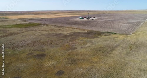 A hydraulic  fracturing rig on the horizon drone approach. photo