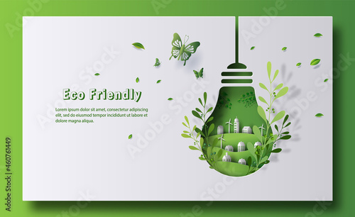 Design for an eco friendly banner, a light bulb shape with city and garden, save the planet and energy concept, paper illustration, and 3d paper.