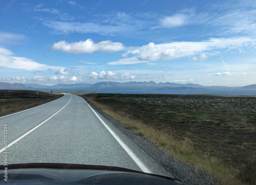 Fototapeta premium Empty road going through Iceland's beautiful southern landscape