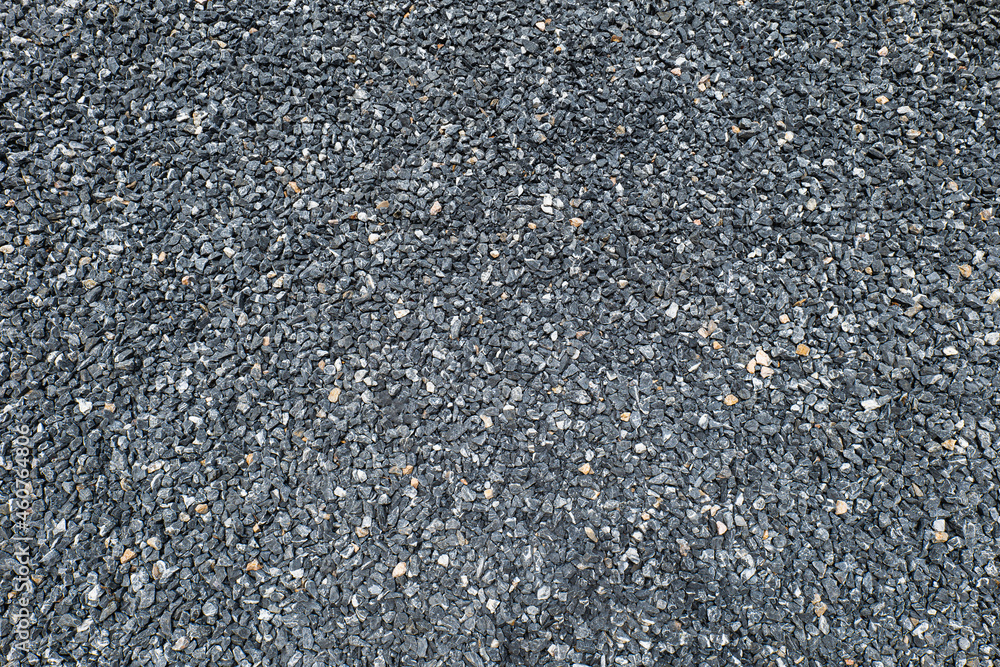 The pebbles were poured onto the ground and flattened to form a garden path, leaving a somewhat uneven texture. The pebbles were poured onto the ground and flattened to form a garden path, leaving a somewhat uneven texture.