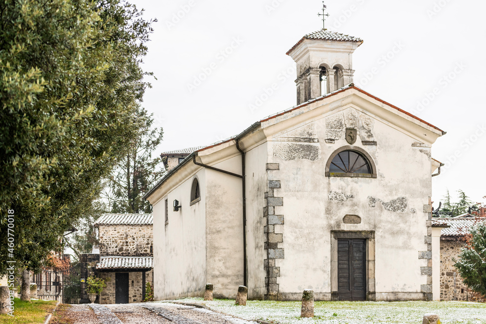 Obraz premium First snow on the hill towns. Between autumn and winter