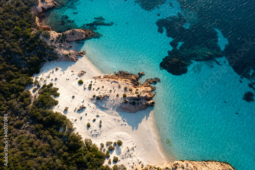 View from above, stunning aerial view of Spargi Island with Cala Soraya, a white sand beach bathed by a turquoise water. La Maddalena archipelago National Park, Sardinia, Italy.