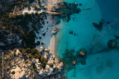 View from above, stunning aerial view of Spargi Island with Cala Corsara, a white sand beach bathed by a turquoise water. La Maddalena archipelago National Park, Sardinia, Italy.
