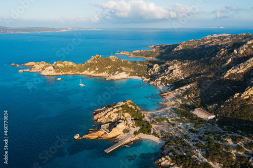 View from above, aerial shot, stunning panoramic view of Spargi Island with Cala Corsara, a white sand beach bathed by a turquoise water. La Maddalena archipelago National Park, Sardinia, Italy.