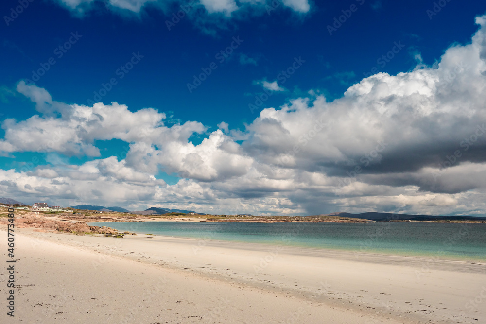 View on Gurteen bay, county Galway, Ireland. Warm sandy beach with clear blue sky and water. Popular travel and holiday destination. Irish landscape. Nobody