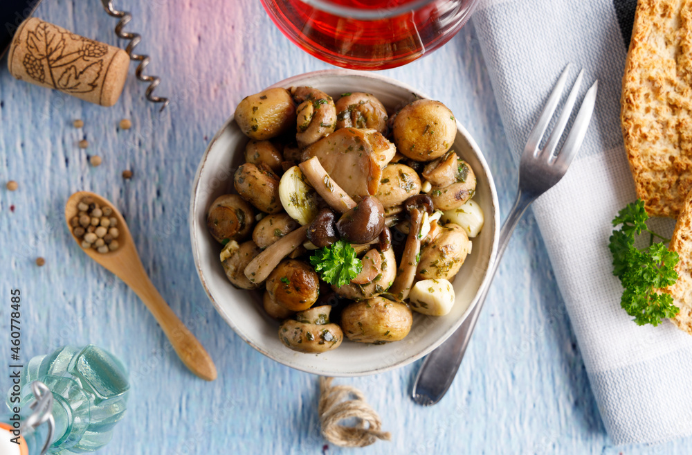 Mushrooms in garlic butter sauce. Mushrooms prepared with garlic , fresh butter and parsley served as a appetizer.