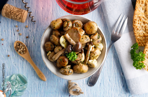 Mushrooms in garlic butter sauce. Mushrooms prepared with garlic , fresh butter and parsley served as a appetizer.