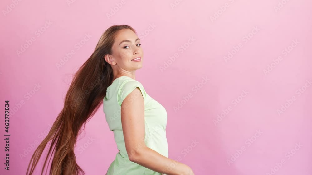 Rear back view of positive tender girlfriend throw long hairdo turn shiny smile Rear back view of positive tender girlfriend throw long hairdo turn shiny smile