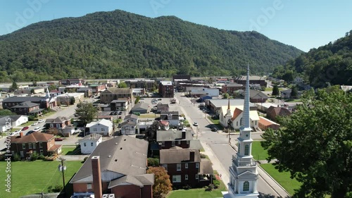 aerial push over church in pineville kentucky, christian church, small town america, hometown, usa, america, made in america photo