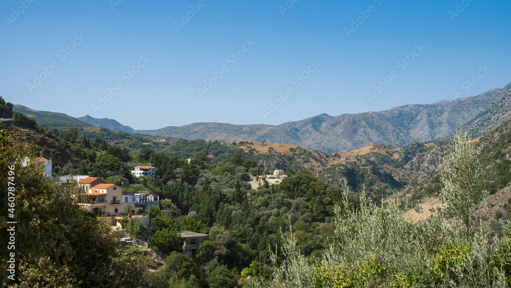 Cretan village in the forest and mountains during the summer