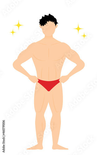 両手を腰に当ててポージングするボディビルダーの男性