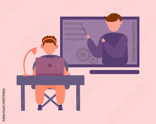 A boy studies online on a computer