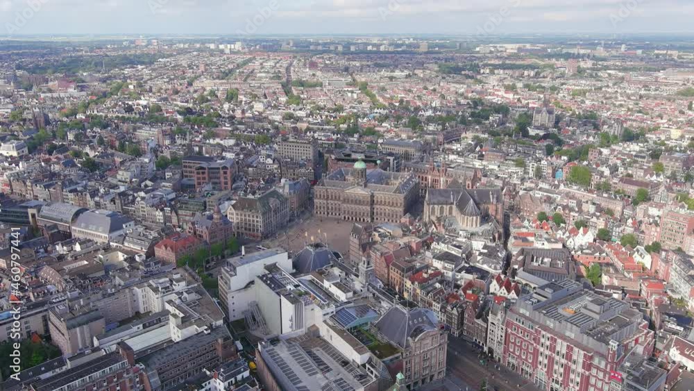 Amsterdam: Aerial view of capital city of Netherlands, Royal Palace Amsterdam (Koninklijk Paleis Amsterdam) and Dam Square in historic center of city - landscape panorama of Europe from above Amsterdam: Aerial view of capital city of Netherlands, Royal Palace Amsterdam (Koninklijk Paleis Amsterdam) and Dam Square in historic center of city - landscape panorama of Europe from above